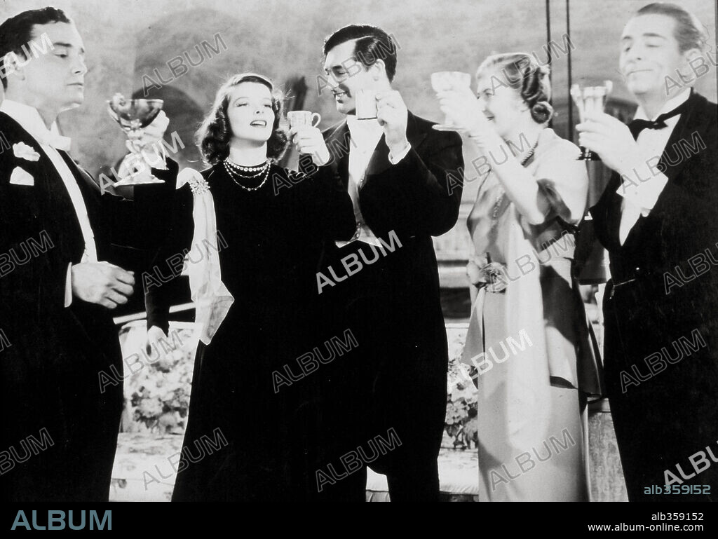 BINNIE BARNES, CARY GRANT, EDWARD EVERETT HORTON, KATHARINE HEPBURN and LEW AYRES in HOLIDAY, 1938, directed by GEORGE CUKOR. Copyright COLUMBIA PICTURES.