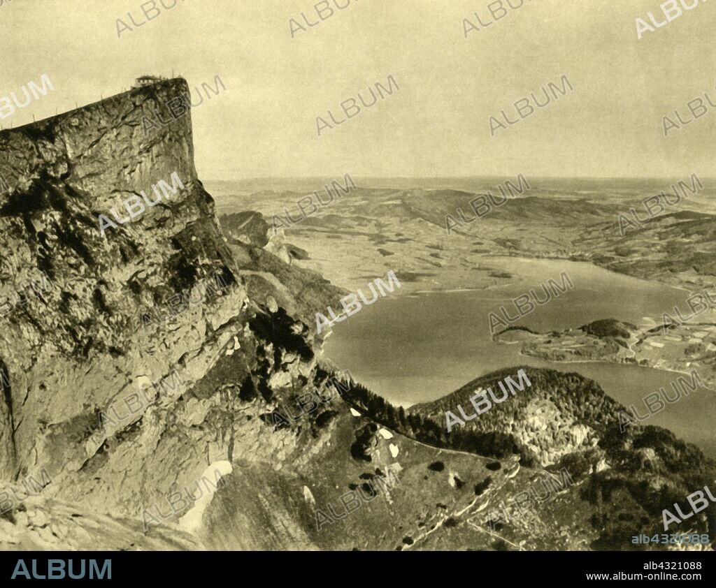 The Schafberg and the Mondsee, Upper Austria, c1935. Hotel on the summit of the Schafberg in the Salzkammergut Mountains, with the Mondsee ('Moon Lake') below. The Berghotel ('mountain hotel') is reached by Austria's steepest steam-powered cog railway which opened in 1893. From "Österreich - Land Und Volk", (Austria, Land and People). [R. Lechner (Wilhelm Müller), Vienna, c1935].