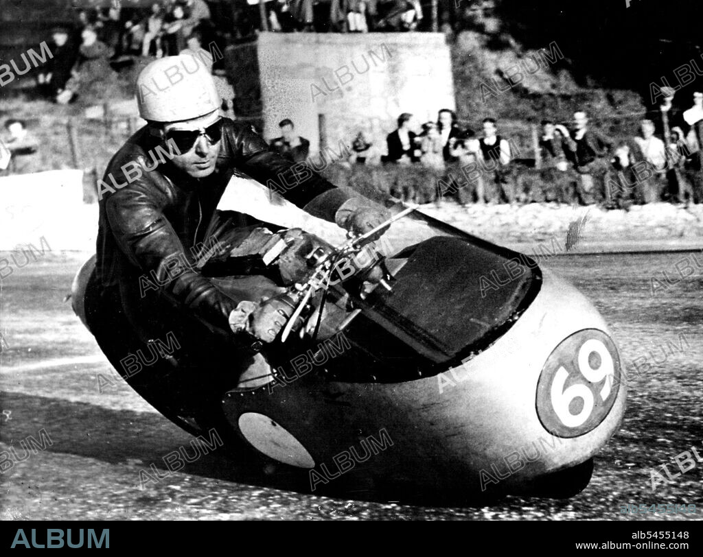 Practice For T.T. Races -- Ken Kavanagh, the Australian ***** the Moto Guzzi Italian team, at speed on his 500 c c Guzzi during practice on the Tourist Trophy Course on the Islands of Matain ***** for next week's *****. June 03, 1955.
