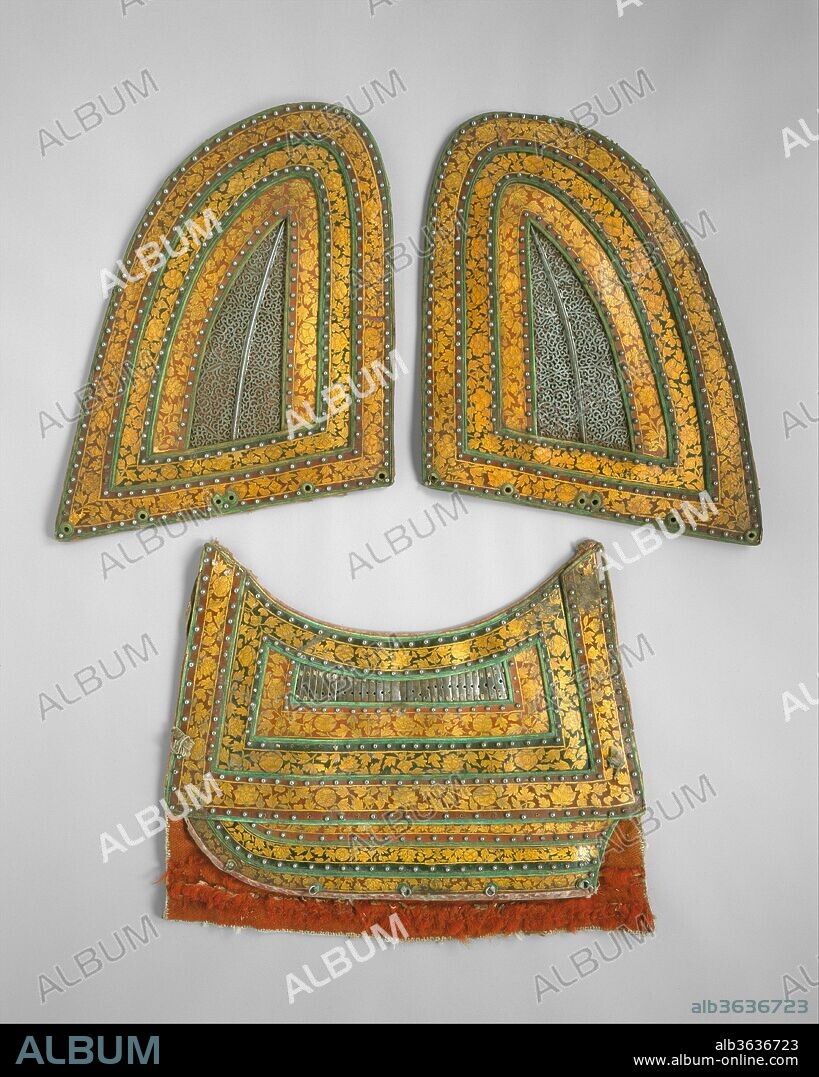 Pair of Neck Defenses (Crinet) and Breast Defense (Peytral) from a Horse Armor. Culture: Tibetan or Mongolian. Dimensions: Left neck panel (a): H. 19 1/2 (49.5 cm); W. 22 in. (55.9 cm); right neck panel (b); H. 19 3/4 in. (50.2 cm); W. 22 in. (55.9 cm); peytral (c): H. 19 in. (48.3 cm); W. 24 1/2 in. (62.2 cm). Date: 15th-17th century.
These three pieces are remarkable for their excellent state of preservation, and rank among the most elaborately decorated examples of Tibetan leather horse armor known. The vivid decoration consists of repeating patterns of stylized lotus, peony, and other blossoms in gold, set against alternating reddish orange, black, and maroon grounds. The lacquerlike effect appears to consist of a base layer or layers of pigmented shellac, the gold floral designs in gold leaf, a layer of shellac over the gold leaf upon which the details were painted in fine black lines, and a final coat or coatings of a tung oil glaze. In addition to their elaborate decoration and fine workmanship, these pieces are very strongly made and would have been fully functional as defensive armor. They, and the few examples like them, represent a high point not only in Tibetan armor making but also in Tibetan leatherwork of any kind. Carbon 14 tests on these pieces resulted in a date range of 1435 to 1665.