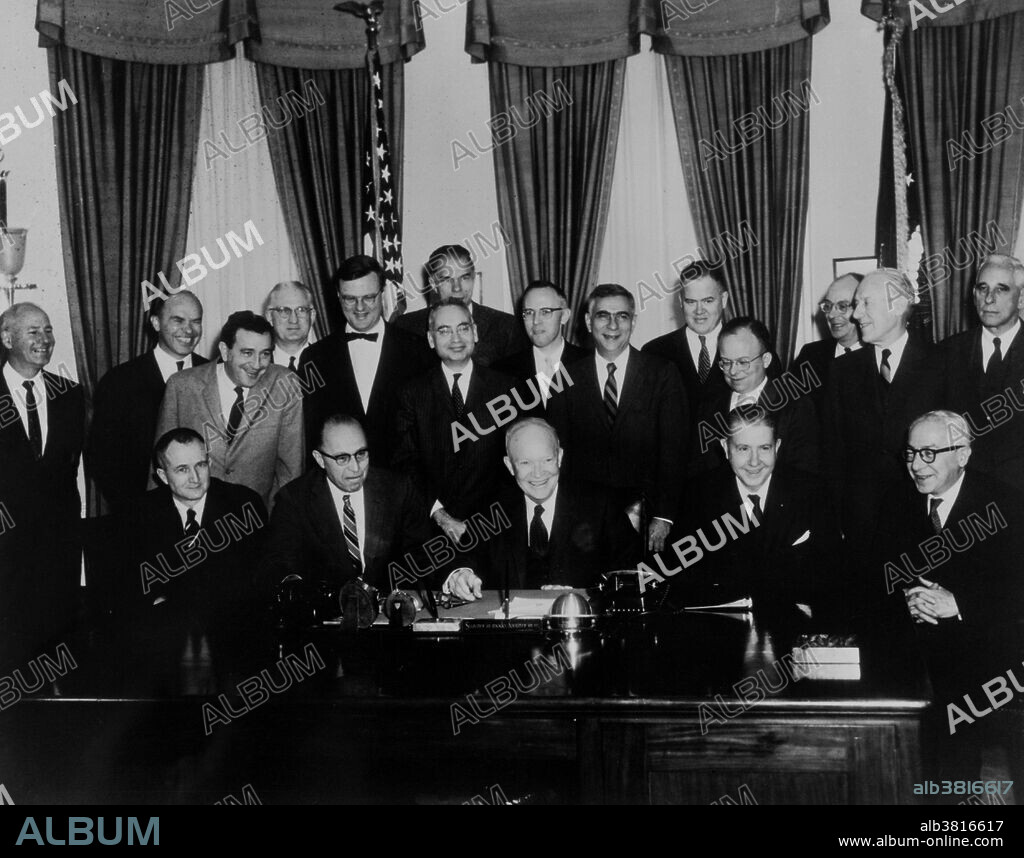 Members of the President's Science Advisory Committee (PSAC) with President Eisenhower at the White House on December 19, 1960. Standing: George Wells Beadle, Donald Frederick Hornig, Jerome Bert Wiesner, Walter Henry Zinn, Harvey Brooks, Glenn Theodore Seaborg, Alvin Martin Weinberg (in front of Glenn Seaborg), David Beckler, Emanuel (Mannie) Ruben Piore, John Wilder Tukey, Wolfgang Kurt Hermann (Pief) Panofsky, John Bardeen, Detlev Wulf Bronk and Robert Frederick Loeb. Seated: James Brown Fisk, George Bogdanovich Kistiakowsky, Dwight David (Ike) Eisenhower, James Rhyne Killian, Jr. and Isidor Isaac Rabi.