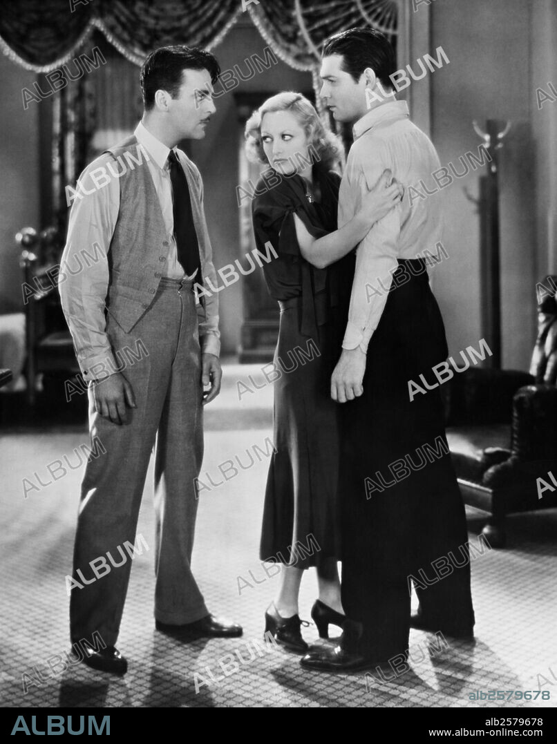 CLARK GABLE, JOAN CRAWFORD and NEIL HAMILTON in LAUGHING SINNERS, 1931, directed by HARRY BEAUMONT. Copyright METRO GOLDWYN MAYER.