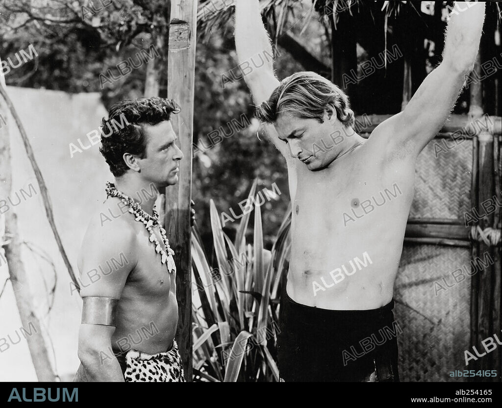 HENRY BRANDON and LEX BARKER in TARZAN AND THE SHE-DEVIL, 1953, directed by KURT NEUMANN. Copyright RKO.