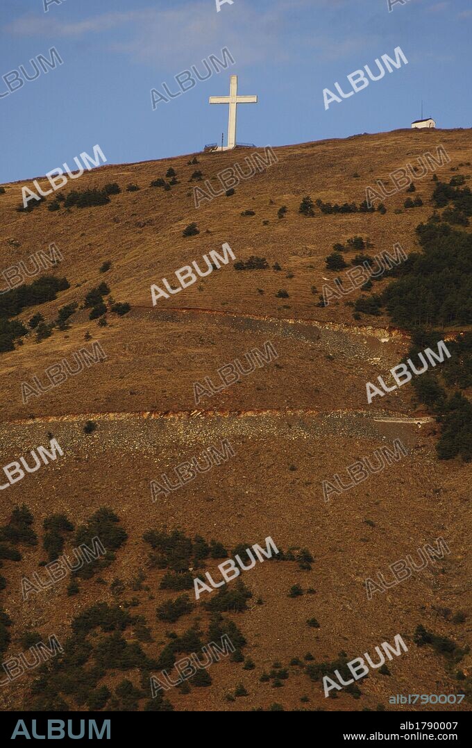 Republic of Albania. Cross in a peak around Korce.