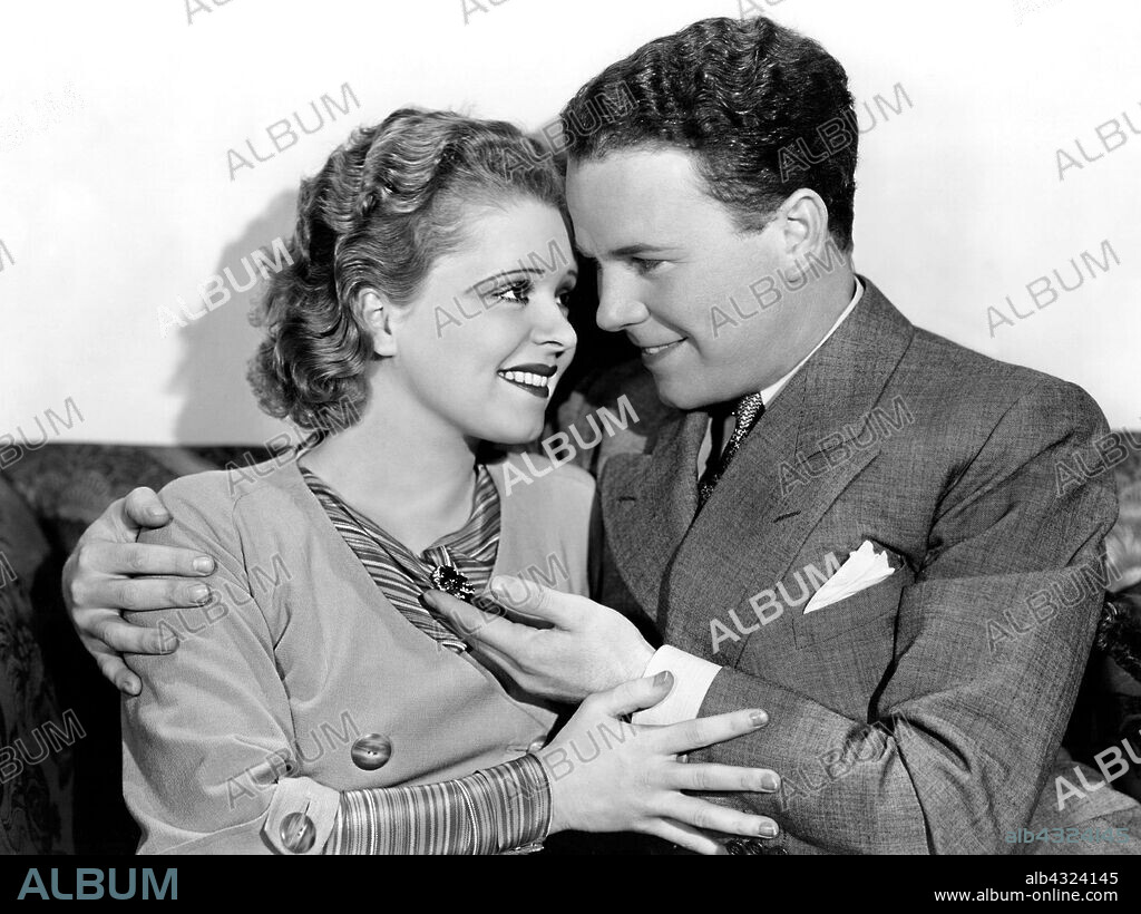 CLARA BOW and REGIS TOOMEY in KICK IN, 1931, directed by RICHARD WALLACE. Copyright PARAMOUNT PICTURES.