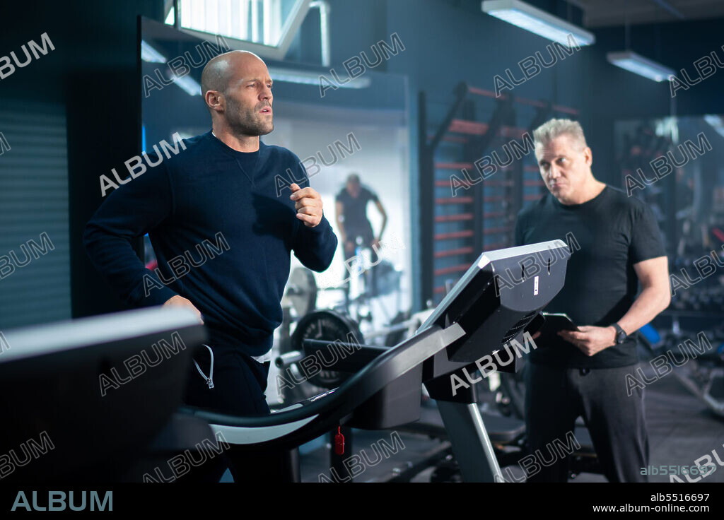 HOLT MCCALLANY and JASON STATHAM in WRATH OF MAN, 2021, directed by GUY RITCHIE. Copyright Metro-Goldwyn-Mayer (MGM).
