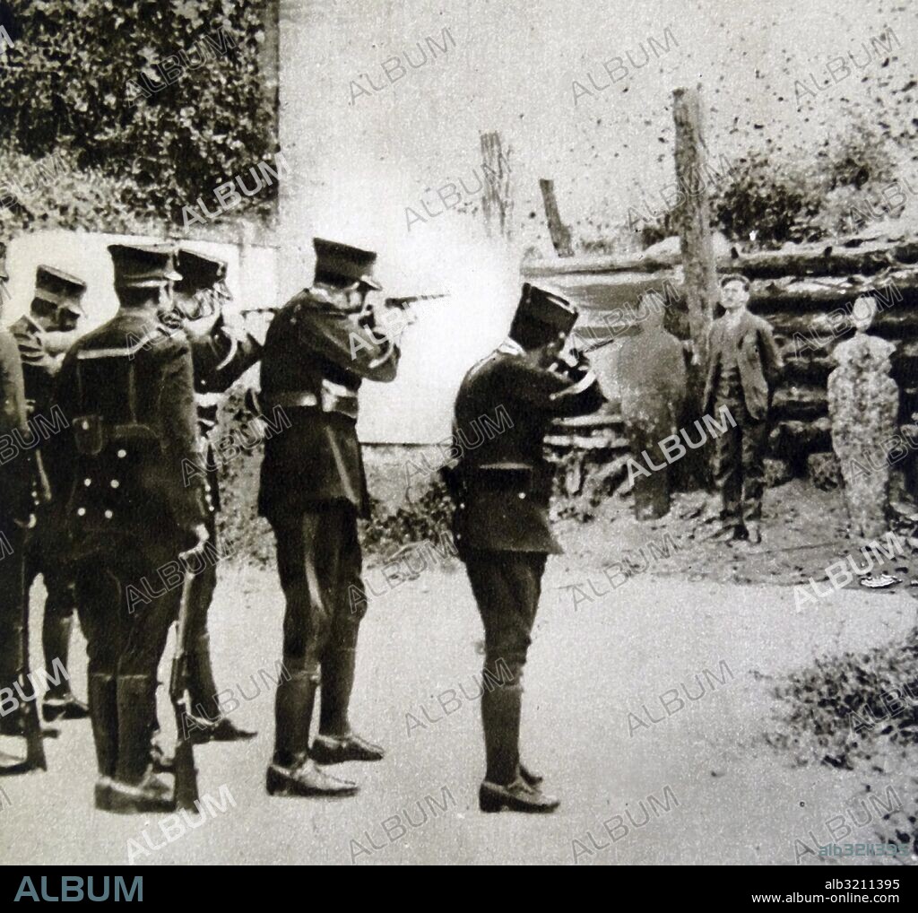 Photograph of Luis Segura Vilchis (1903-1927), a prominent member of the ACJM (Catholic Association of Mexican Youth), facing a Mexican firing squad, with the body of Father Miguel Agustin Pro Juarez, next to him. Dated 20th Century.