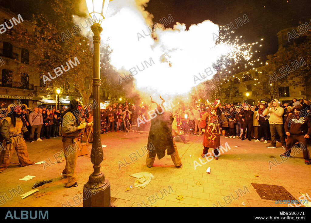 Fire devils dance in Llucmajor - Sant Antoni-, Mallorca, Balearic Islands, Spain.