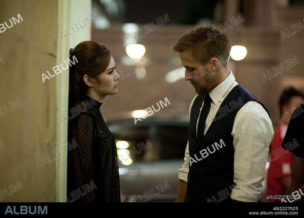 RYAN GOSLING and YAYAYING RHATHA PHONGAM in ONLY GOD FORGIVES, 2013, directed by NICOLAS WINDING REFN. Copyright BOLD FILMS.