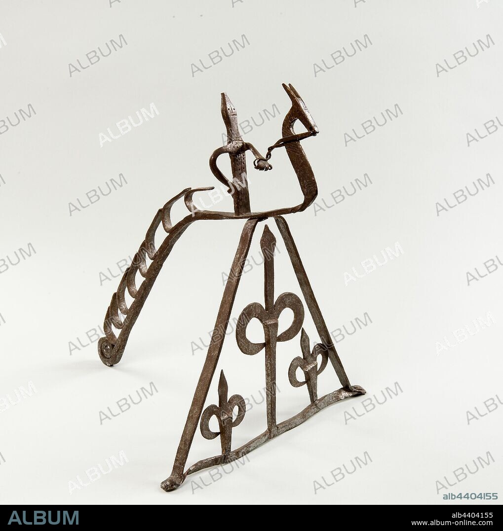 Spanish: Spit, Spanish, 18th–19th century, Iron, This wrought iron object was created by a Spanish craftsperson in the 18th or 19th century. It takes the shape of a horse and rider perched above fleur-de-lis scroll work. A spit for roasting meat would have been placed in the rack created by the horse's tail. The spit could be moved up and down in the rack to adjust the cooking temperature., Overall: 16 1/8 x 13 3/4 x 14 in. (41 x 34.9 x 35.6 cm).