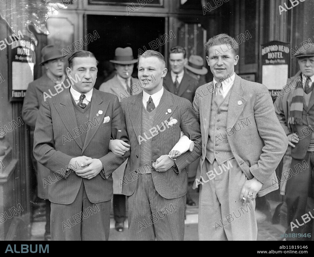 Police boxing Champions at the Bedford Head Hotel after the contests at the Albert Hall . Left to Right :-. H Hornemann (Beaten by Magill). W Meitschke ( who lost to Rolland ) and. E Campe ( Winner of the Welter Weight Championship ). 1934.