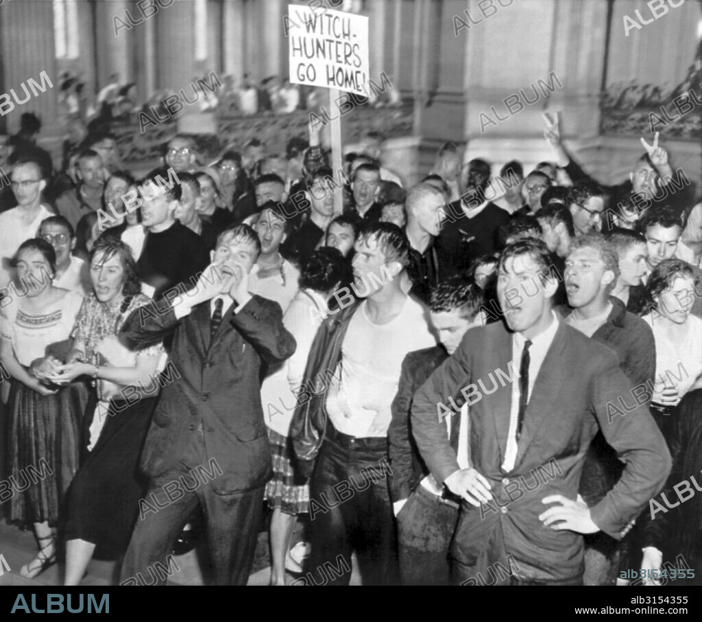 San Francisco, California: 1961. College student demonstrators inside of SF City Hall jeer the police first attempt with fire hoses to quell their protest against the House Committee on Un-American Activities (HUAC) hearing that is taking place here in San Francisco.