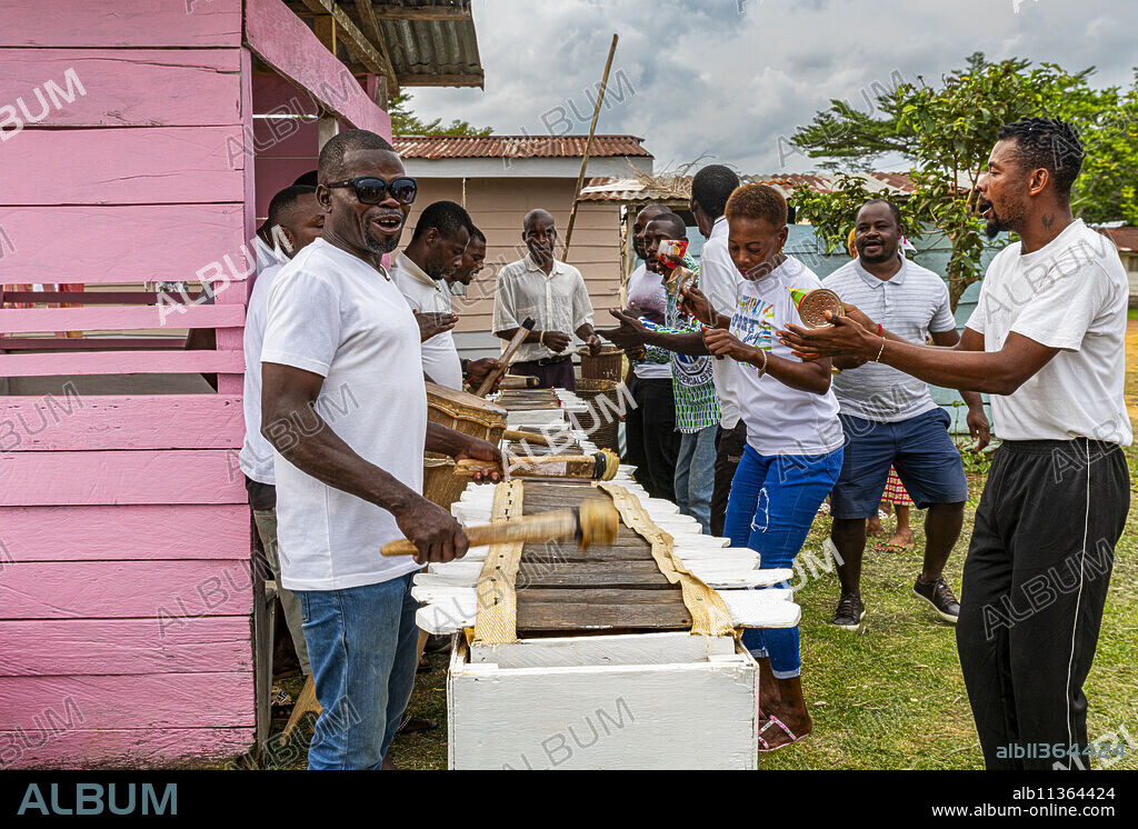 Locals practising traditional music, Ciudad de la Paz, Rio Muni, Equatorial Guinea, Africa.