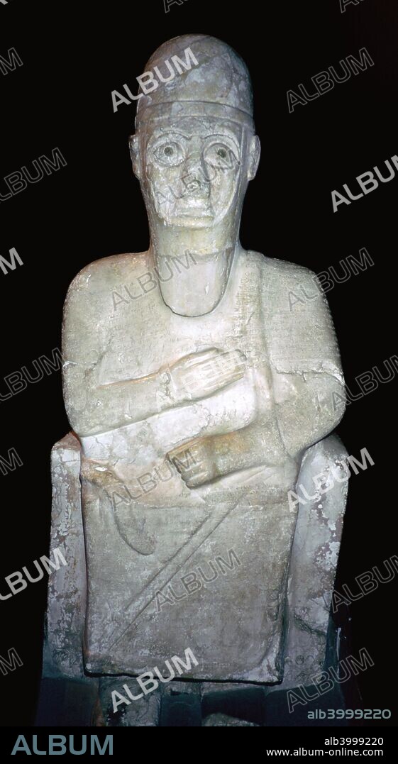 Statue of Idrimi, a king of Alalakh, Late Bronze Age/Syrian, 16th century BC. An inscription in Babylonian cuneiform script says that he was one of the sons of the royal house of Aleppo, which was subject to the powerful kingdom of Mitanni. The territory of Aleppo included the smaller city state of Alalakh. From the British Museum's collection.