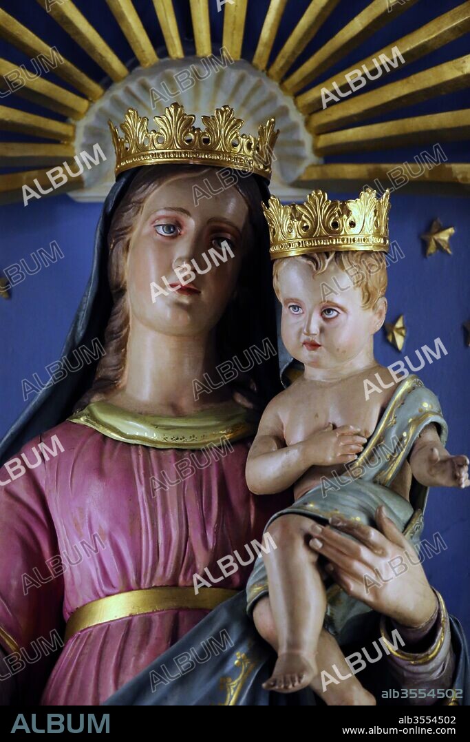 The Parish Church of Stresa, Santi Ambrogio and Theodolo. Virgin and child statue. Italy.