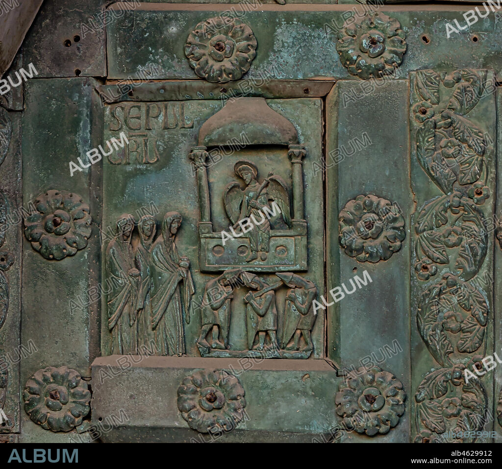 Monreale Cathedral, the gate by Bonanno Pisano (1185-6): bronze tile depicting "The Resurrection at the Sepulchre" (scene of the New Testament).. The gate is signed "Bonanno civis pisanus". It depicts five scenes of the Old Testament at the bottom, starting with Adam and Eve, and five scenes of the New Testament at the top, ending in "Christ and Mary in the glory of Paradise".