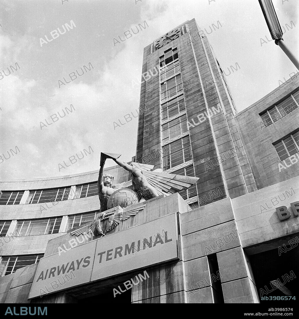 BOAC Air Terminal building, London, 1960-1972. The facade of the British Overseas Airlines Corporation Air Terminal building in Victoria showing the clock tower and winged sculture above the main entrance.