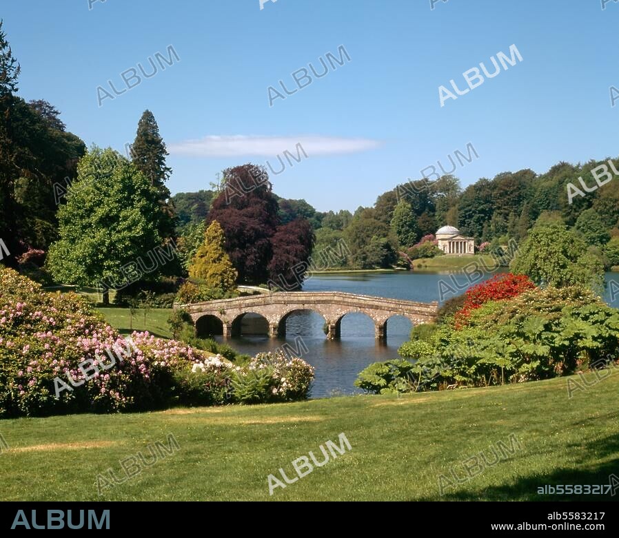 England, Wiltshire, Stourhead estate (Palladian mansion, the village of Stourton, gardens, farmland and woodland), Stourhead Gardens:. View of the Palladian Bridge and Pantheon. Photo.