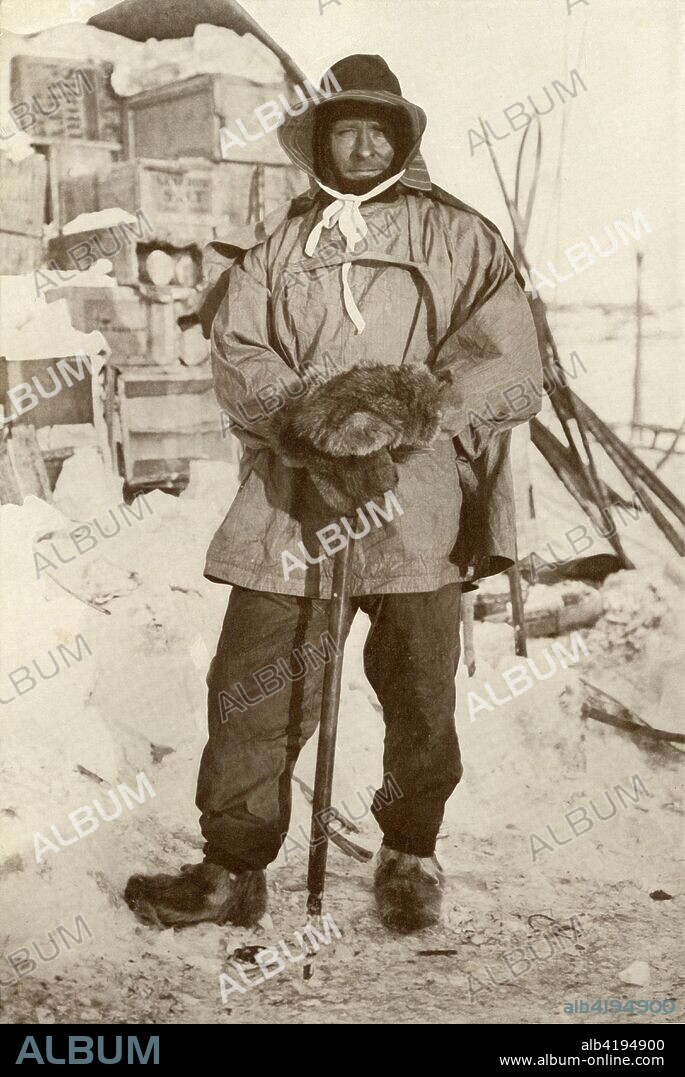 Petty Officer Edgar Evans, R.N.', 1911, (1913). Evans (1876-1912) with fur gloves and an ice-axe, boxes of supplies in the background. He died on the return journey from the South Pole. The final expedition of British Antarctic explorer Captain Robert Falcon Scott (1868-1912) left London on 1 June 1910 bound for the South Pole. The Terra Nova Expedition, officially the British Antarctic Expedition (1910-1913), included a geologist, a zoologist, a surgeon, a photographer, an engineer, a ski expert, a meteorologist and a physicist among others. Scott wished to continue the scientific work that he had begun when leading the Discovery Expedition to the Antarctic in 1901-04. He also wanted to be the first to reach the geographic South Pole. Scott, accompanied by Dr Edward Wilson, Captain Lawrence Oates, Lieutenant Henry Bowers and Petty Officer Edgar Evans, reached the Pole on 17 January 1912, only to find that the Norwegian expedition under Amundsen had beaten them to their objective by a month. Delayed by blizzards, and running out of supplies, Scott and the remainder of his team died at the end of March. Their bodies and diaries were found eight months later. From Scott's Last Expedition, Volume I. [Smith, Elder & Co., London, 1913].