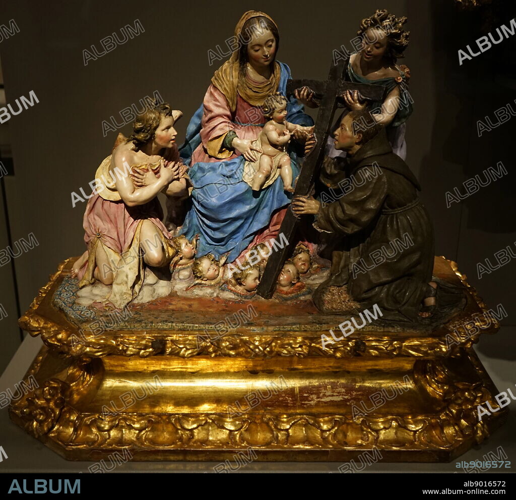 Sculpture titled 'The Virgin and Child with St Diego of Alcalá' by Luisa Roldán (1652-1706) a Spanish sculptor of the Baroque period. Dated 17th Century.