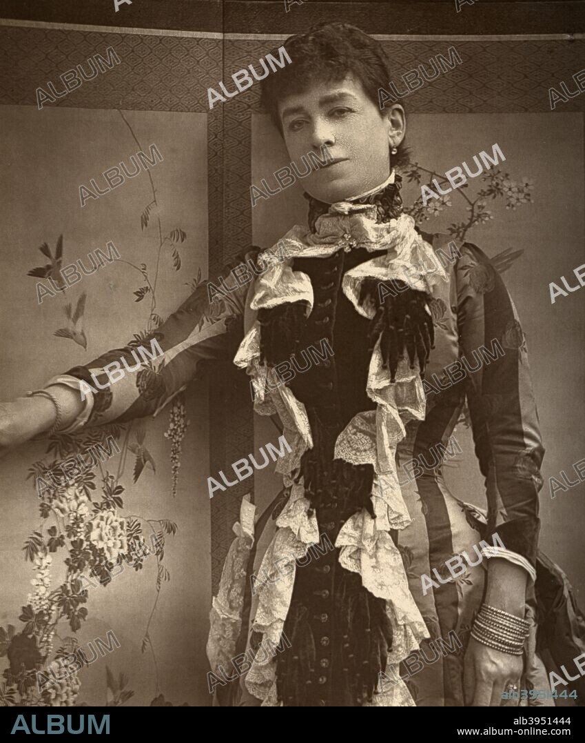British actress Lady Monckton in 'Jim the Penman', 1886. Born Maria Louisa Long, Lady Monckton was the wife of Sir John Braddick Monckton, who was Town Clerk of London. 'Jim the Penman' is a play by Sir Charles Young, 7th Baronet, first performed in 1886. The subject of the play is the Victorian barrister and forger James Townsend Saward. A photograph from The Theatre, A Monthly Review, Volume VIII, July to December, 1886, edited by Clement Scott, Carson & Comerford, London, 1886.