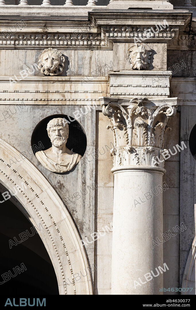 Brescia, piazza della Loggia (a Renaissance square where the Venetian influence is evident), Palazzo della Loggia: detail of the white Botticino marble facade with a column, a capital and one of the thirty Caesars, a cycle created by Gasparo da Cairano and Tamagnino.