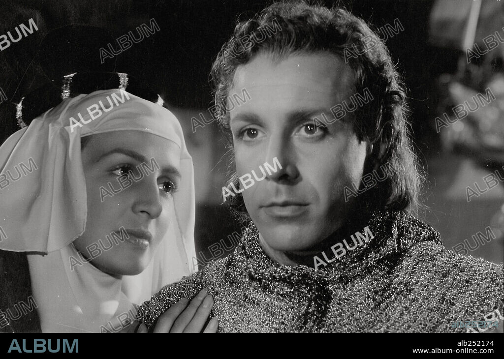 FERNANDO REY and MARUCHI FRESNO in REINA SANTA, 1947, directed by RAFAEL GIL. Copyright FILMES ALBUQUERQUE/CESAREO GONZALEZ PROD. CINEM./SUEVIA FILM.