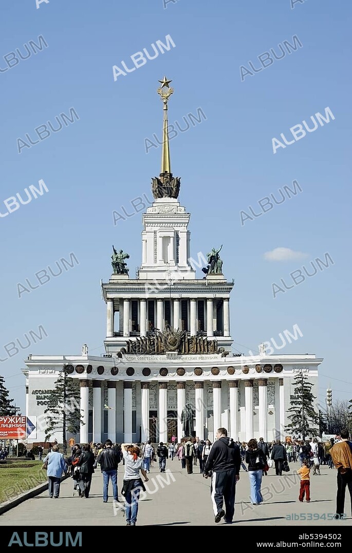 Moscow VVTs or VDNKh, All Russian Exhibition Centre, central pavilion, and many people on a sunny week-end day, Moscow, Russia, Europe.