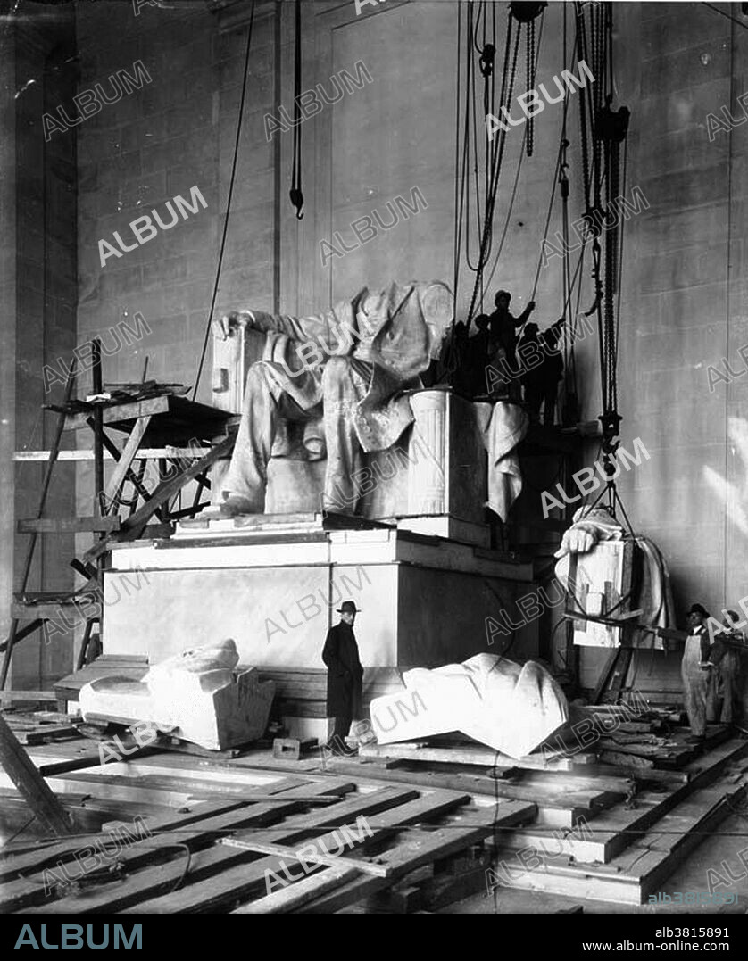 Abraham Lincoln Statue installation in the Lincoln Memorial, Washington, D.C., 1920. The Lincoln Memorial is an American national monument built to honor the 16th President of the United States, Abraham Lincoln. It is located on the National Mall in Washington, D.C. across from the Washington Monument. The architect was Henry Bacon, the sculptor of the primary statue, Abraham Lincoln was Daniel Chester French, and the painter of the interior murals was Jules Guerin. It is one of several monuments built to honor an American president. The statue of Lincoln, originally designed to be 10 feet tall, was enlarged to 19 feet to prevent it from being overwhelmed by the huge chamber.