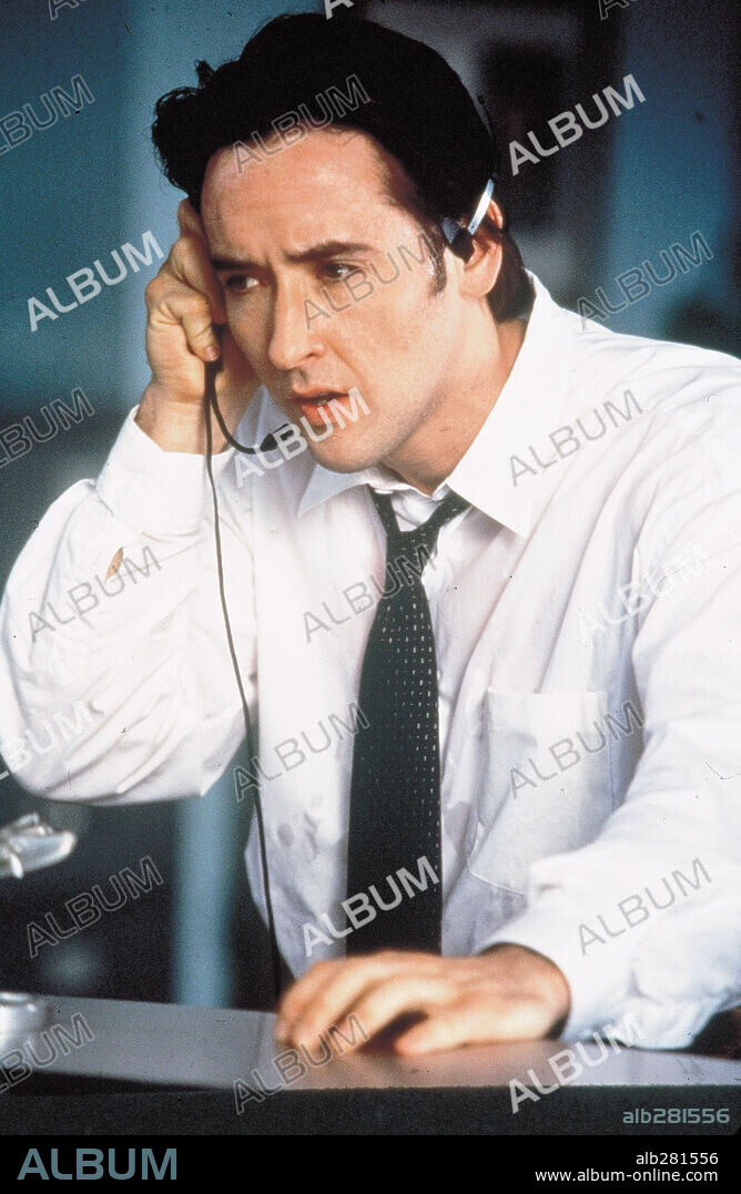 JOHN CUSACK in CON AIR, 1997, directed by SIMON WEST. Copyright TOUCHSTONE PICTURES.
