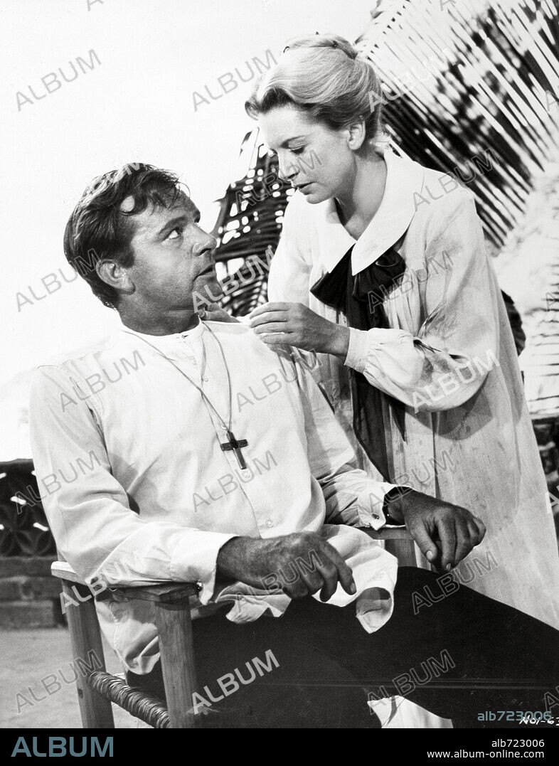 DEBORAH KERR and RICHARD BURTON in THE NIGHT OF THE IGUANA, 1964, directed by JOHN HUSTON. Copyright M.G.M.