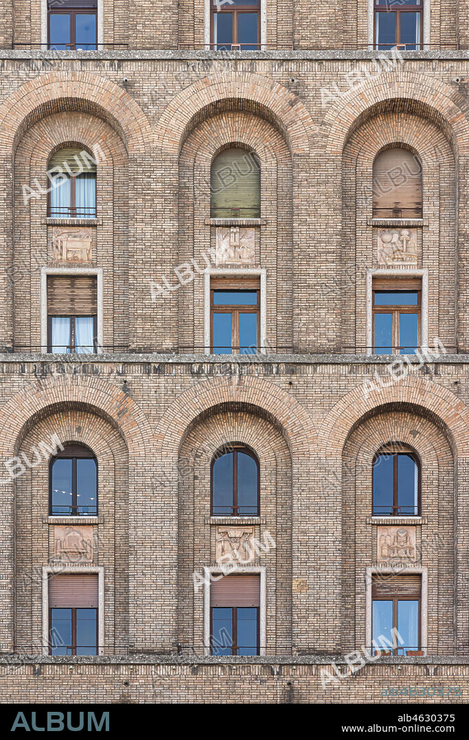 Brescia, piazza della Vittoria (square built between 1927 and 1932) designed by the architect and urban planner Marcello Piacentini: the Torrione Ina, the first skyscraper built in Italy (57.52 meters high). Detail of the façade.