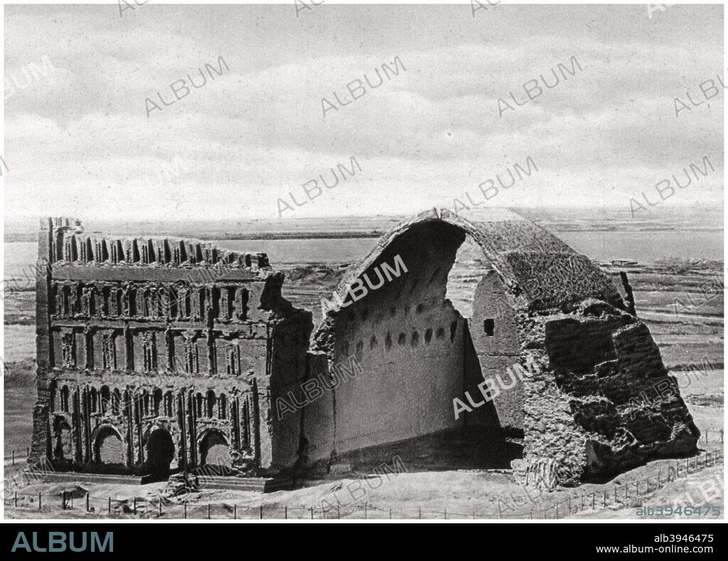 The Taq-i Kisra from the air, Ctesiphon, Iraq, 1925. Ctesiphon was the capital of the Sassanid Persian Empire. This great arch was the main portico of the audience hall of the imperial palace. A print from Baghdad, Camera Studio Iraq, published by Hasso Bros, Rotophot AG, Berlin, 1925.