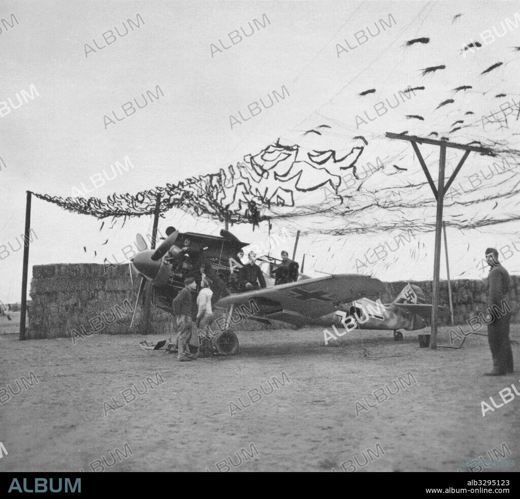 German ground crew overhaul a Me-109.
