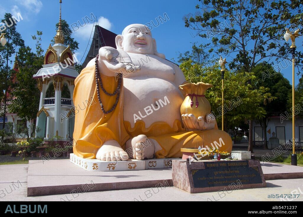 Budai (Chinese: ??; pinyin: Bùdài), pronounced Hotei in Japanese, B? Ð?i in Vietnamese, is a Chinese folkloric deity. His name means 'Cloth Sack' and comes from the bag that he is conventionally depicted as carrying. He is usually identified with (or as an incarnation of) Maitreya Buddha, so much so that the Budai image is one of the main forms in which Maitreya Buddha is depicted in East Asia. He is almost always shown smiling or laughing, hence his nickname in Chinese, the Laughing Buddha (Chinese: ??; pinyin: xiào?fó). Many people confuse Budai with Gautama Buddha. Trang has been a trading center since at least the 1st century AD. It grew to prosperity between the 7th and 13th centuries during the Srivijaya period and remains an important commercial town today. Rubber, palm oil and fishing are the mainstays of the town's economy. Tourism is making an increasing impact as Trang’s Anadaman Coast and islands are increasingly developed and popularized. The town has a strong Overseas Chinese character (and hence good Chinese restaurants) as a result of an influx of Chinese labor in the latter half of the 19th century.