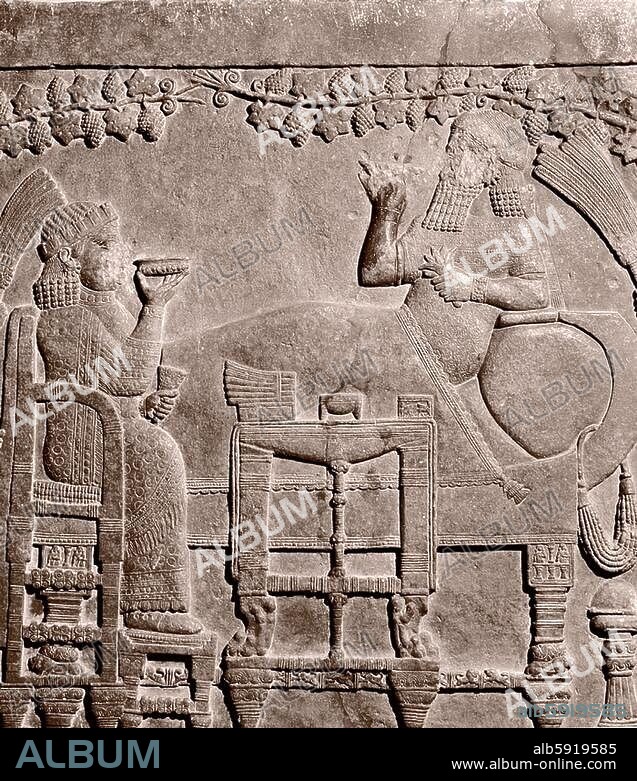 A relief from the Palace of Ashurbanipal. The king and his queen feasting in the royal gardens following the defeat and death of the Elamite King Teumman at the battle of Til-Tuba in 653. Detail of king and queen. Country of Origin: Ancient Middle East. Culture: Assyrian. Date / Period: Late Assyrian, c. 645 BC. Place of Origin: Nineveh,.