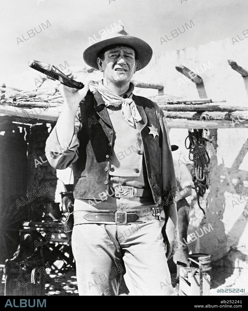 JOHN WAYNE in RIO BRAVO, 1959, unter der Regie von HOWARD HAWKS. Copyright WARNER BROTHERS.