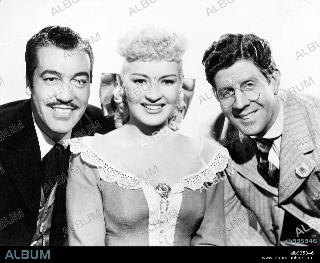 BETTY GRABLE, CESAR ROMERO and RUDY VALLEE in THE BEAUTIFUL BLONDE FROM BASHFUL BEND, 1949, directed by PRESTON STURGES. Copyright 20TH CENTURY FOX.