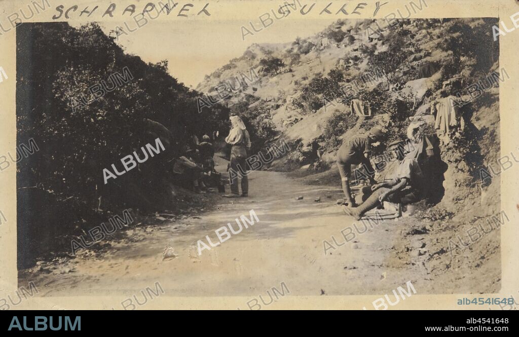 Photograph - Soldiers on Road, Shrapnel Gully, Gallipoli, Turkey, Trooper George Simpson Millar, World War I, 1915, Photograph in an album that belonged to an Australian serviceman in the 5th Australian Light House during World War I. The album contains 103 small black and white photographs, mainly of Gallipoli in 1915 and some of France and Belgium. They are believed to have been taken by Trooper George Simpson Millar, service no. 160, 'A' Troop, 'C' Squadron, 5th Australian Light Horse Regiment,.
