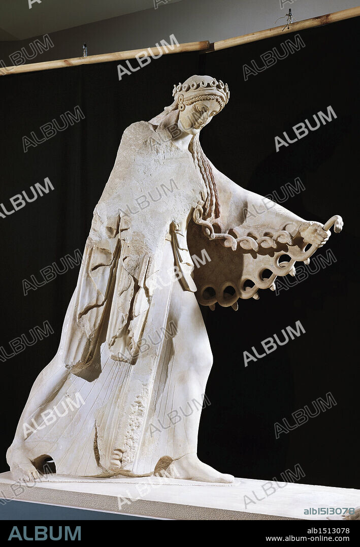 Greek civilization, 6th century b.C. Marble statue of Athena from the east pediment of the Temple of Athena Polis depicting a Gigantomachy, 520 b.C.