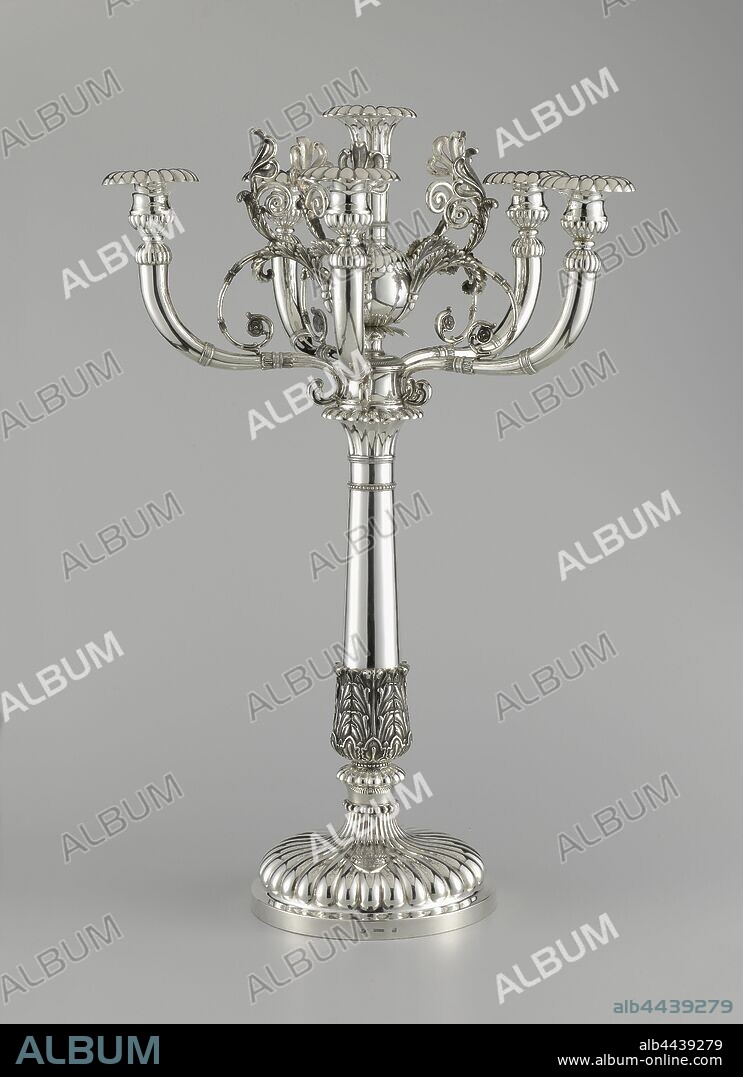 Two candelabra, Candelabrum with six arms, with the alliance weapon Von Nagell of Gartrop-Van Nagell of Ampsen, Candelabrum of silver with a round base and a stem rejuvenating upwards. Six outwardly bent arms that are grouped around a sphere. The base and the candle holders are decorated with godrons. Leaf motifs and tendrils were arranged around the trunk and crowning, respectively. The tendrils run into a Greek palmet. The driven alliance weapon Von Nagell from Gartrop-Van Nagell from Ampsen, ornament derived from plant forms, A.D. Pijzel, The Hague, 1842, silver (metal), h 55 cm.