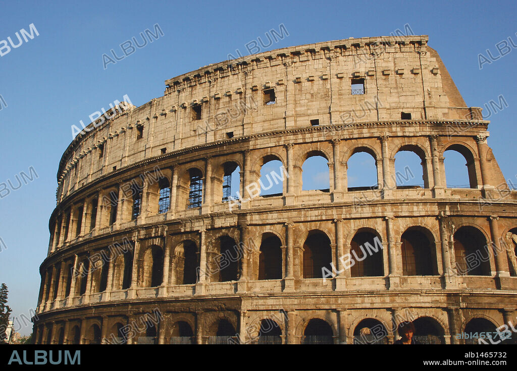 Roman Art. The Colosseum (Coliseum) or Flavian Amphitheatre. Its construction started between 70 and 72 AD under emperor Vespasian. Was completed in 80 AD under emperor Titus.  View outside building. Rome. Italy. Europe.