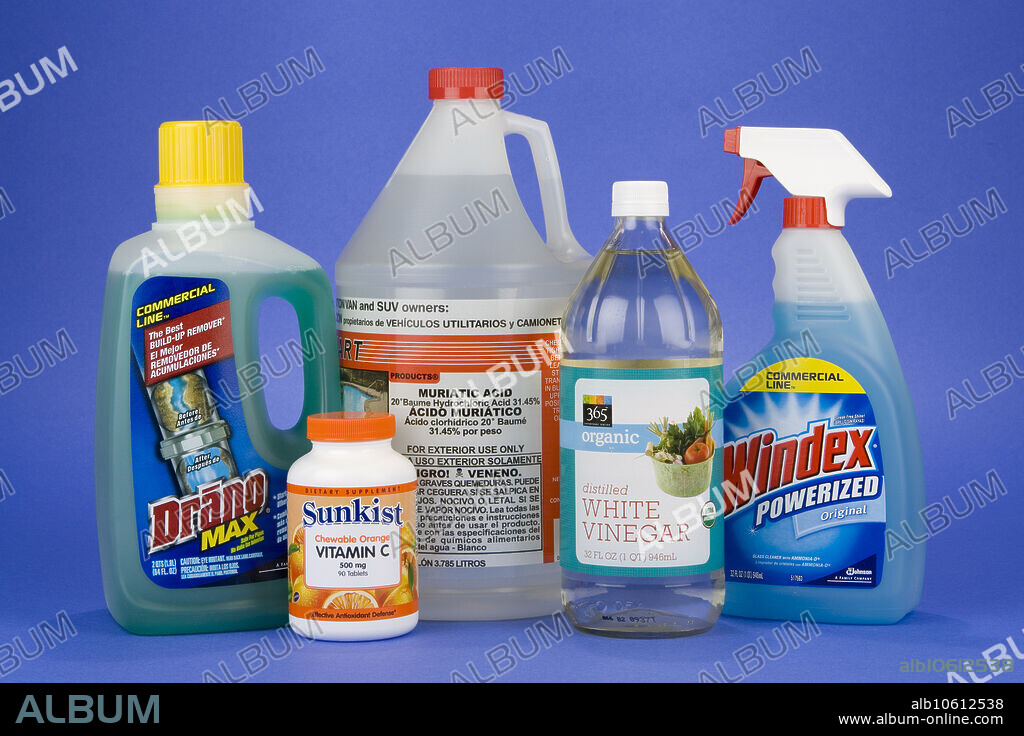 Editorial use only . Common household acids and bases: Drano, Vitamin C, Muriatic Acid, White Vinegar, Windex. Vinegar is Acetic acid (HC2H3O2); Vitamin C is Ascorbic acid (C6H8O6 or with its ionized hydrogens written first, H2C6H6O6); Muriatic acid is Hydrochloric acid (HCl); Windex is Ammonia (NH3); and Drano is Sodium Hydroxide (NaOH).