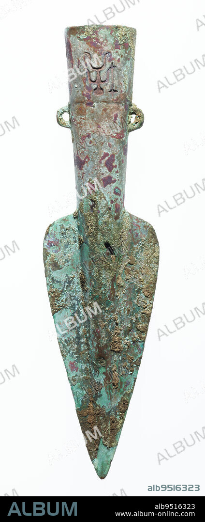 Spearhead (mao), late 13th century BCE, 7 3/4 × 2 1/16 × 1 1/16 in. (19.69 × 5.24 × 2.7 cm), Bronze, China, 13th century BCE, Two inscribed Shang dynasty bronze spearheads dating to the Anyang period (thirteenth to mid-eleventh century BCE). Each has a flat, leaf-shaped blade with a single point and double edges on a tapered, hollow socket with a pair of loops above the reinforced rim for fixing to a shaft. Spearheads resembling this pair were excavated from tomb M54 at Huayuanzhuang-dong in Anyang, datable to Phase II of the Anyang period which is contemporary to the famous Tomb of Fuhao, the consort of King Wuding, who died around 1200 BCE. The ears on the bronze spearheads were used to fix them onto a shaft. From the Western Zhou onward, perforations and nail holes were used as the principal method of fastening. Bronze spears were prevalent during Shang times since battles were primarily fought on foot, but they became less common in the Western Zhou and later as chariot warfare became more common.