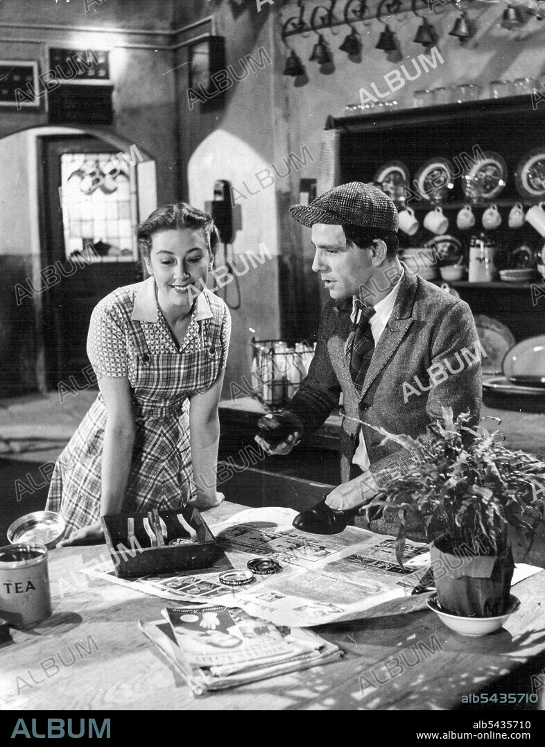 Mary (Shirley Abicair) who is very fond of Norman (Norman Wisdom) expects a kiss from him When she down to the Kitchen in the morning. "Got anything me" she asks expectantly. "Cup of tea. It's in pot",is his disappointing reply. "One Good Turn", starring Norman Wisdom in his second screen comedy, is produced by Maurice Cowan and directed by John Paddy Carstairs - the team responsible for the record-breaking "Trouble in Store". Joan Rice, Thora Hird, Shirley Abicair and Russell Enoch head the la.