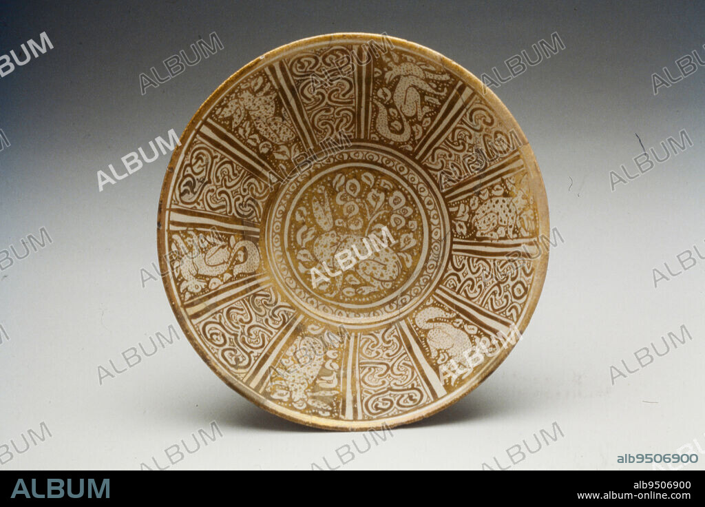 Bowl with hare and dog motifs, late 12th- early 13th century, before 1220, 3 3/4 x 8 13/16 in. (9.53 x 22.38 cm), Stonepaste with golden luster-painted decoration, Kashan ware, Iran, Seljuk period (1038- c.1194).