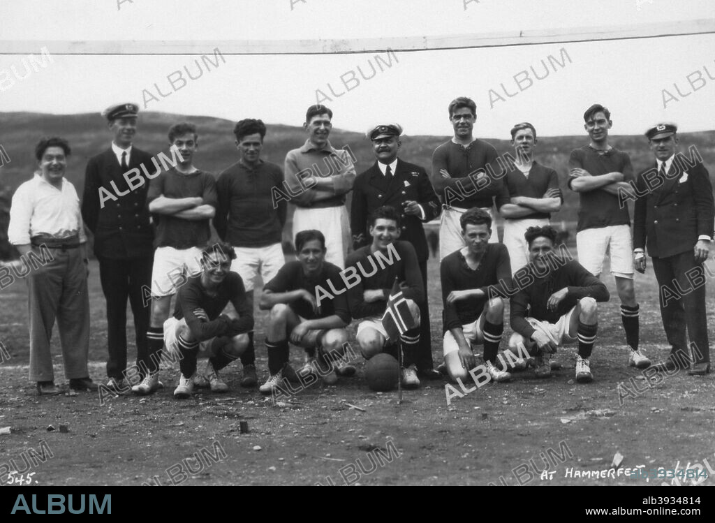 Football team, Hammerfest, northern Norway, 20 July 1929. One of the teams from two ships, the Blue Star Line's cruise ship 'Arandora Star' and the 'Spark', who played a match against each other at Hammerfest, a town inside the Arctic Circle.
