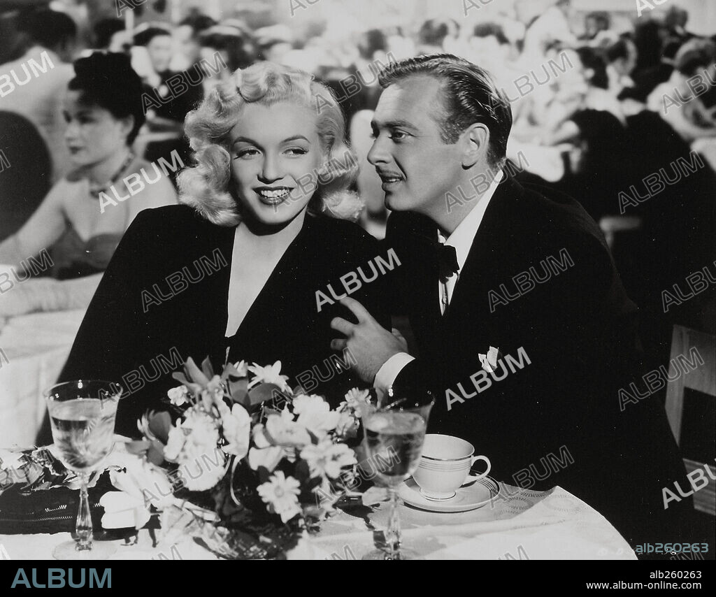 NORMA JEAN BAKER y RAND BROOKS. MARILYN MONROE y RAND BROOKS en LAS CHICAS DEL CORO, 1948 (LADIES OF THE CHORUS), dirigida por PHIL KARLSON. Copyright COLUMBIA PICTURES.