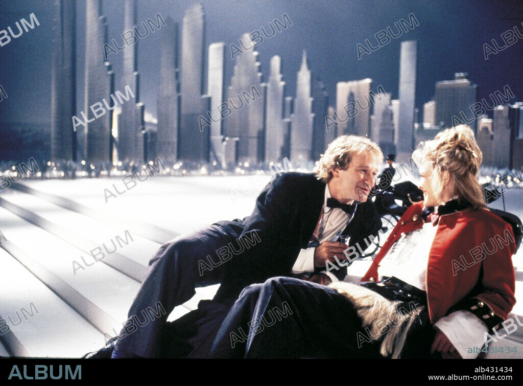 ROBIN WILLIAMS and ROBIN WRIGHT in TOYS, 1992, directed by BARRY LEVINSON. Copyright 20TH CENTURY FOX / BALDWIN, SIDNEY.