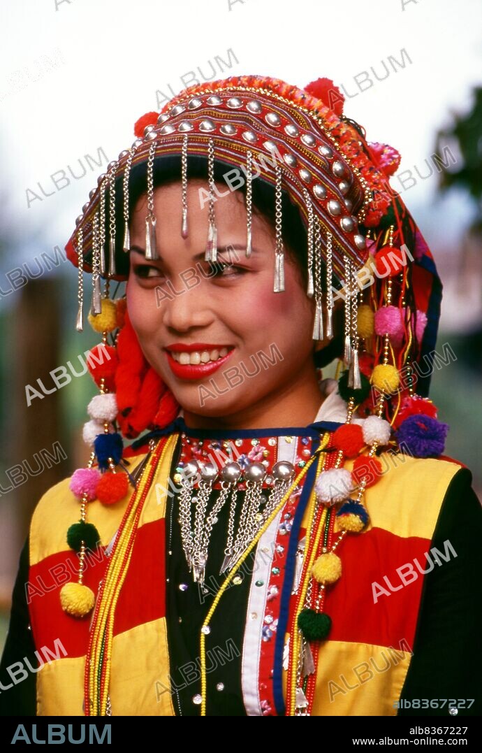 Burma / Myanmar: Lisu woman in traditional costume, Manhkring, Myitkyina, Kachin State.<br/><br/>. The Lisu people (Lìsù zú) are a Tibeto-Burman ethnic group who inhabit the mountainous regions of Burma (Myanmar), Southwest China, Thailand, and the Indian state of Arunachal Pradesh.<br/><br/>. About 730,000 live in Lijiang, Baoshan, Nujiang, Diqing and Dehong prefectures in Yunnan Province, China. The Lisu form one of the 56 ethnic groups officially recognized by the People's Republic of China. In Burma, the Lisu are known as one of the seven Kachin minority groups and an estimated population of 350,000 Lisu live in Kachin and Shan State in Burma. Approximately 55,000 live in Thailand, where they are one of the six main hill tribes. They mainly inhabit the remote country areas. Their culture has traits shared with the Ayi culture.